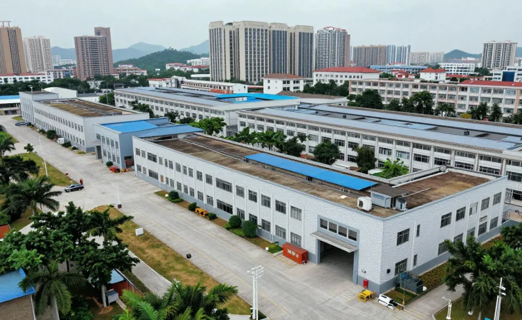 Modern sewing workshop in China factory equipped with precision machines for manufacturing custom leather handbags and delicate mulberry silk products.